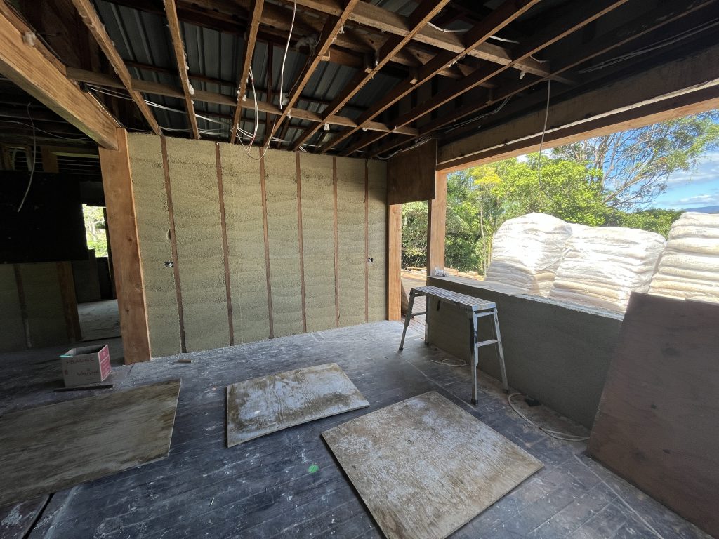 hempcrete wall with exposed uprights