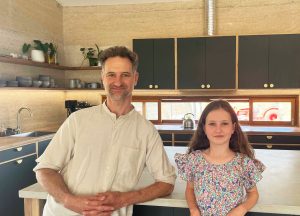 Jeremy Thomas BD and daughter Zali in Hempcrete home